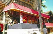 At funeral ceremony. Traditional house tongkonan with cofin. Tana Toraj area. Indonesia.
