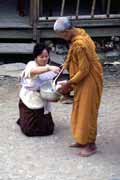 Morning offering. Pakbeng village. Laos.