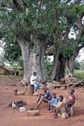 In front of house, Boukoumb area. Benin.