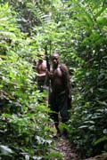 Pygmy is hunting, village down to the Lobe River. The Pygmy people are gatherers and hunters. They hunt animals such as antelopes, pigs and monkeys, and also gather honey, wild yams, berries and other plants. Cameroon.