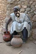 Local wizard (fetichuer) or crab sorcerer (a fortune-teller who tells your future by watching the moves of a crab). Rhumsiki (Roumsiki) village at Mandara Mountains. Cameroon.