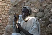 Local wizard (fetichuer) or crab sorcerer (a fortune-teller who tells your future by watching the moves of a crab). Rhumsiki (Roumsiki) village at Mandara Mountains. Cameroon.