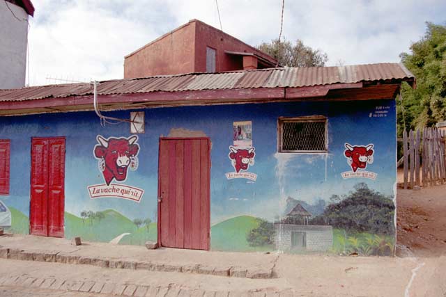 House and advertising to the french cheese Happy cow, Ambohimanga village. Madagascar.